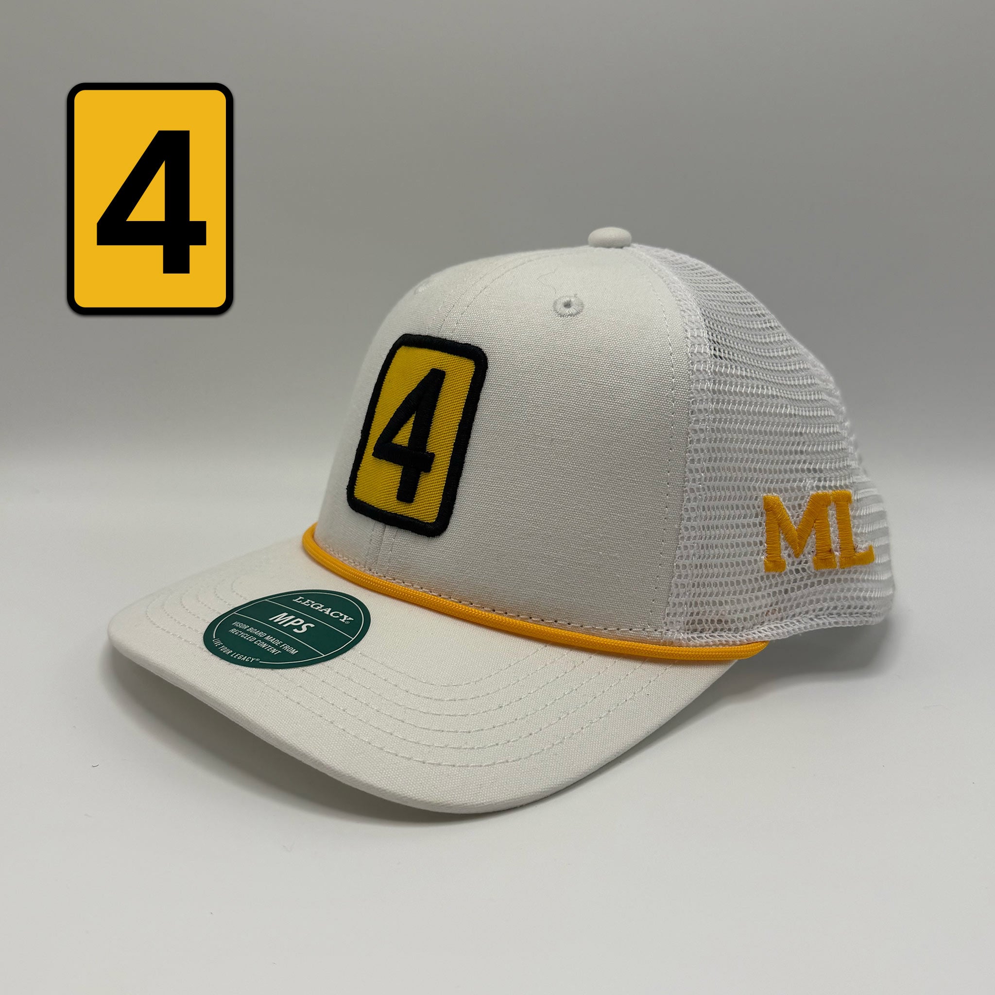 A white trucker-style baseball cap with a yellow and black embroidered number 4 on the front and an orange 'ML' logo on the side. The cap features a curved brim with a yellow stripe, a green sticker, and is shown against a neutral gray background with a yellow '4' graphic overlay in the top left corner.